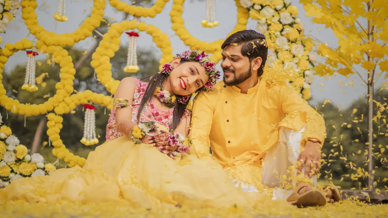 Man offers flowers to his wife Pexels