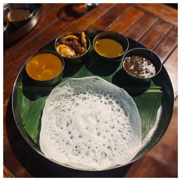 Appam and prawn curry