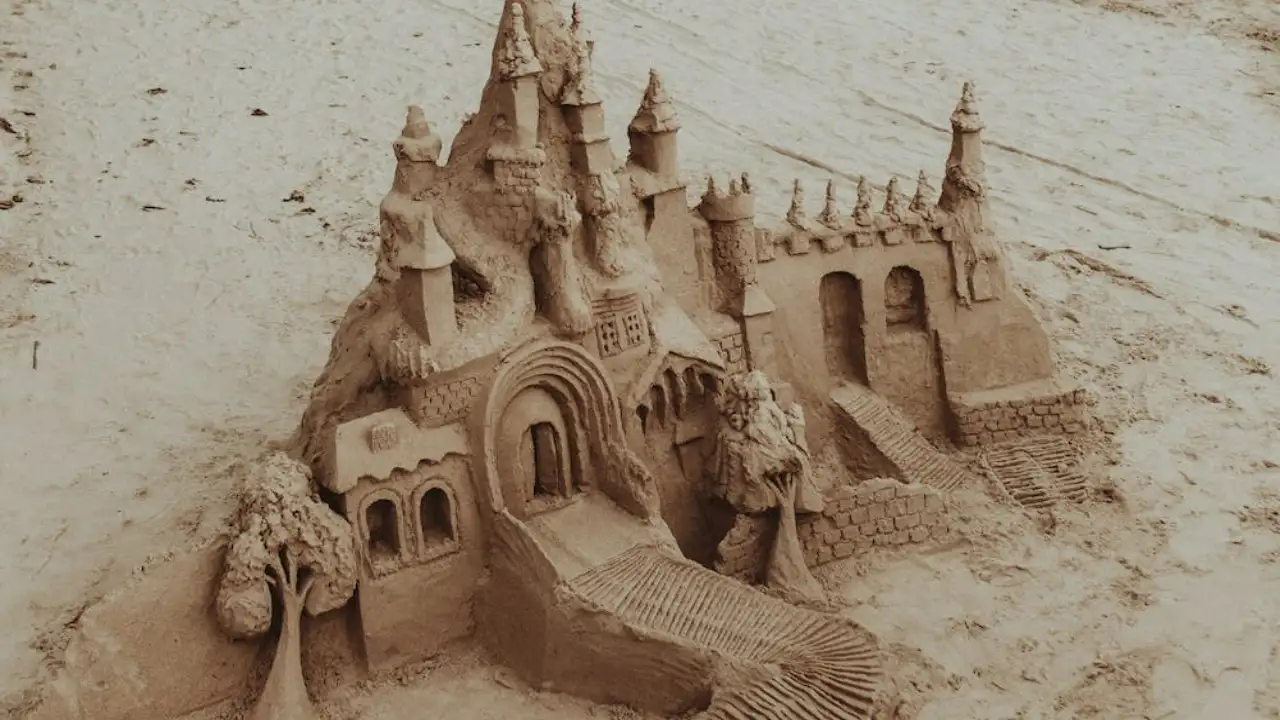 Building sandcastles by the shore Pexels