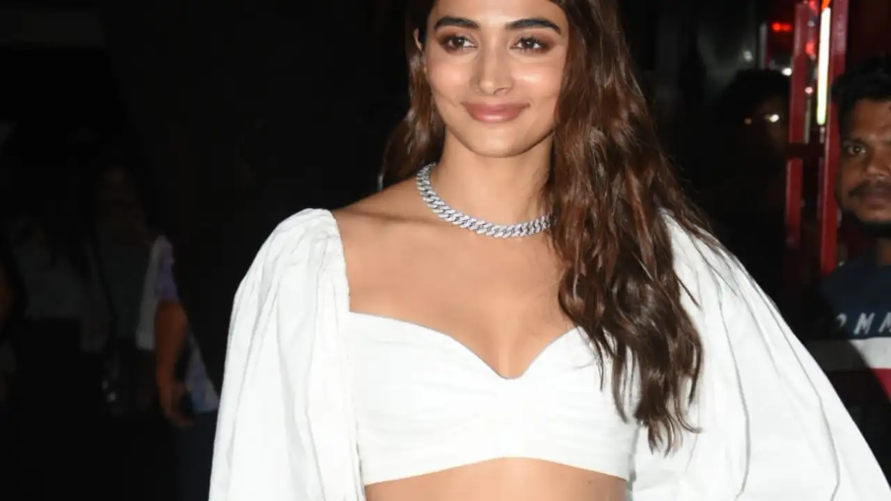Hegde Sex - PHOTOS: Pooja Hegde serves up another glam look in a sexy puffy sleeves  crop top and flared cargo pants | PINKVILLA