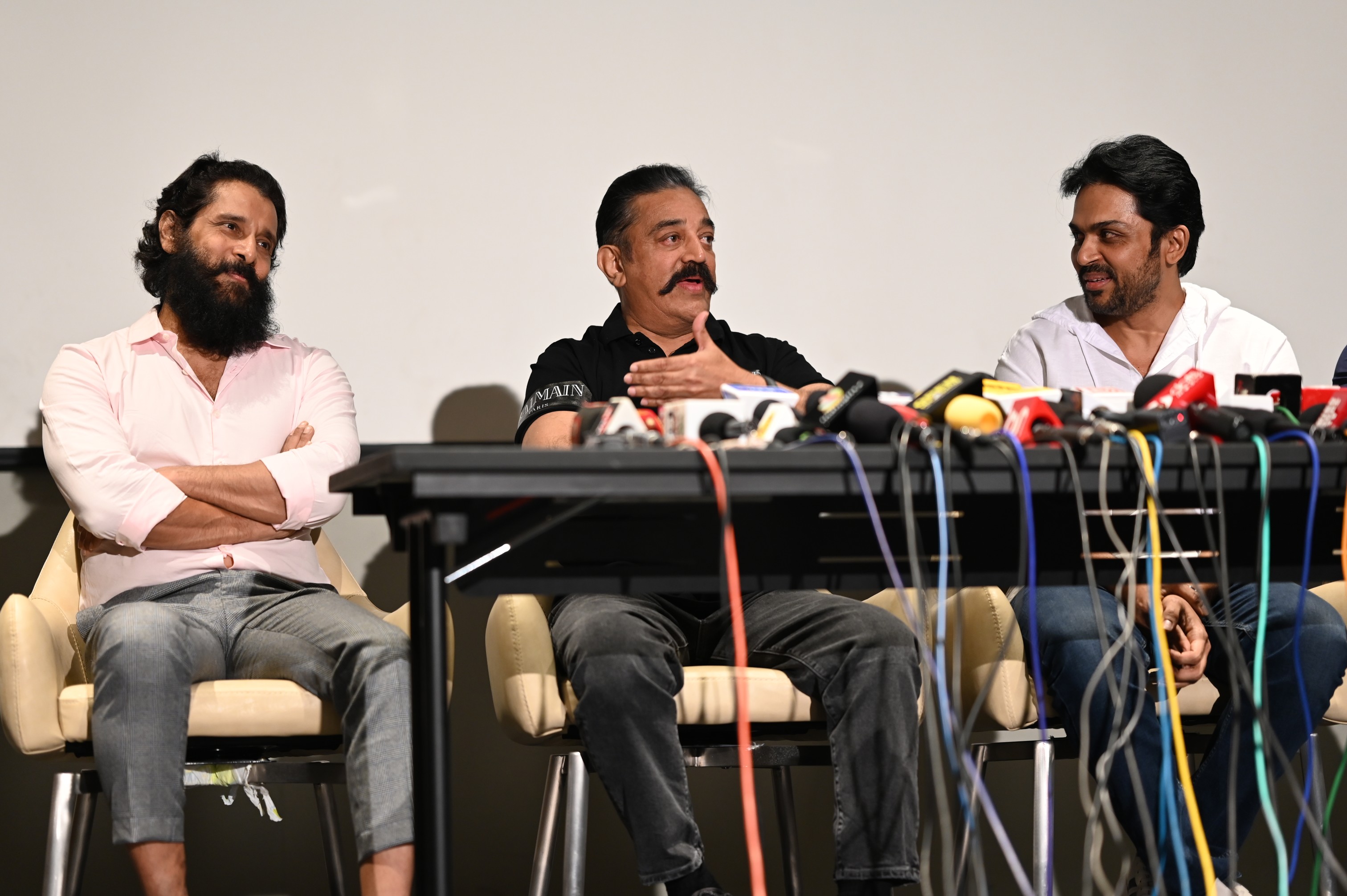 Kamal Haasan accompanied with Vikram and Karthi