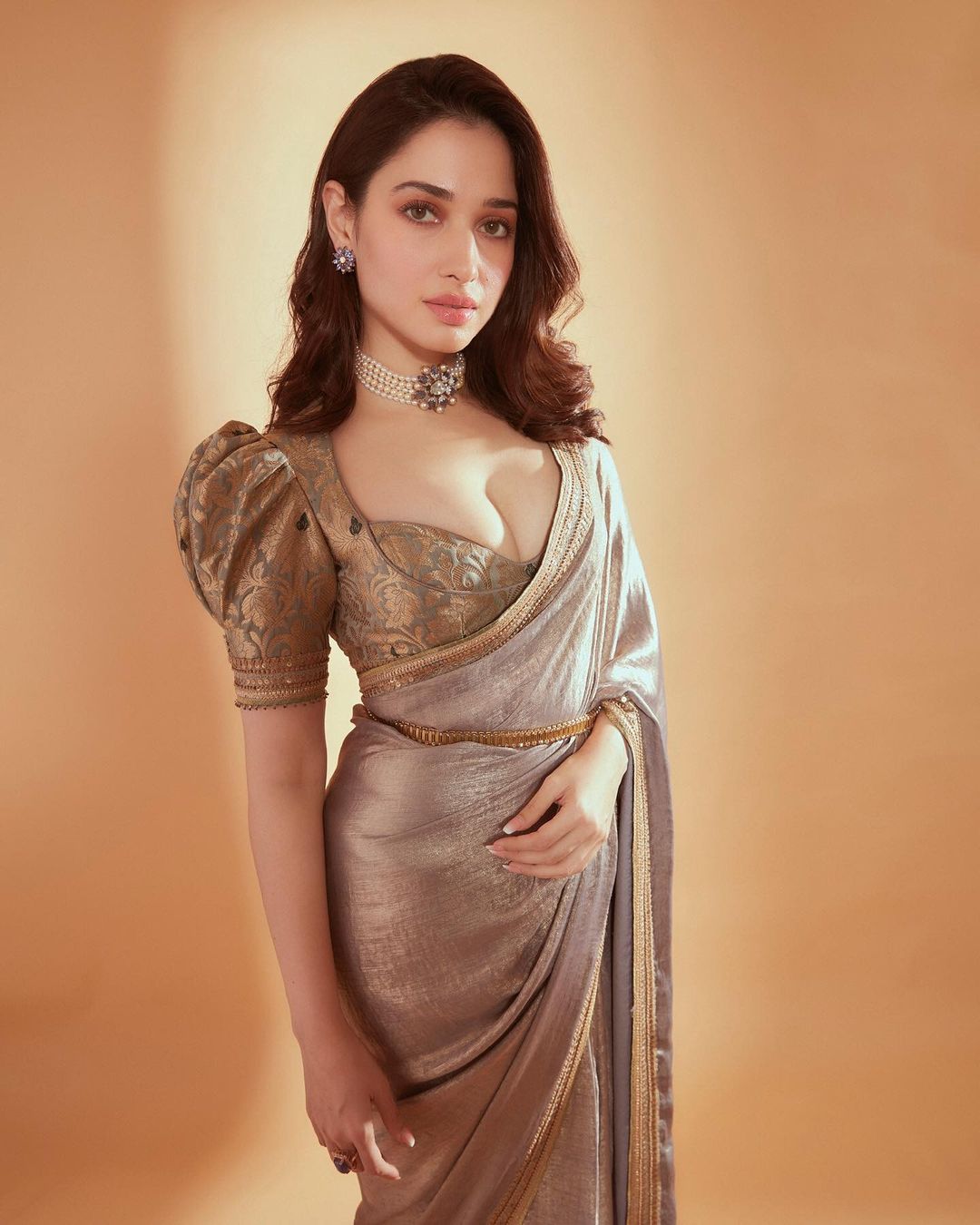 Did you notice Tamannaah Bhatia's sexy brocade blouse? Check out her look if you love cocktail-ready drapes