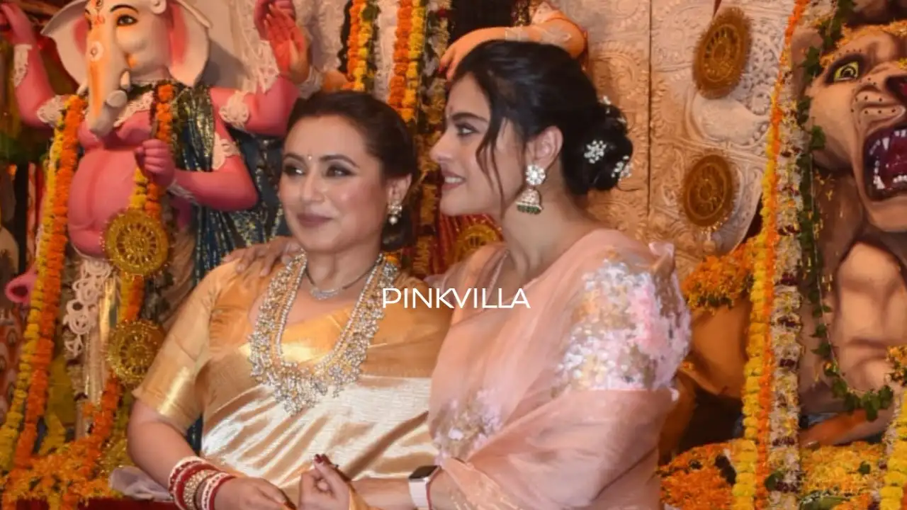 Rani and Kajol pose for shutterbugs Rani and Kajol pose for shutterbugs