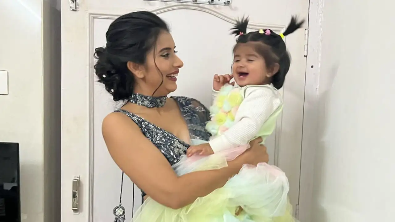 Charu Asopa looks beautiful and is all smiles as she poses with Ziana Charu Asopa looks beautiful and is all smiles as she poses with Ziana
