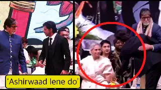 Shah Rukh Khan bows down and touches Amitabh Bachchan's feet in front of thousands of audience 