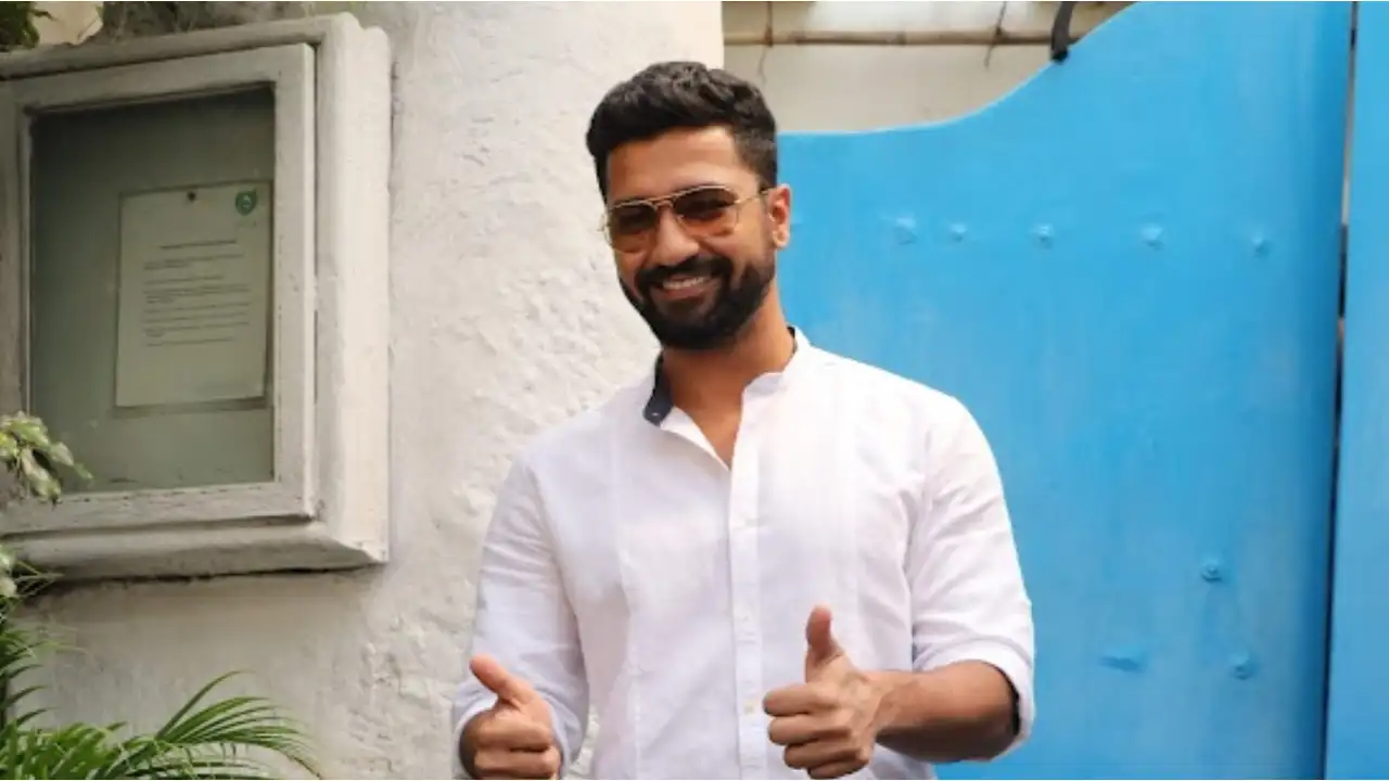 Vicky Kaushal posing for the shutterbugs