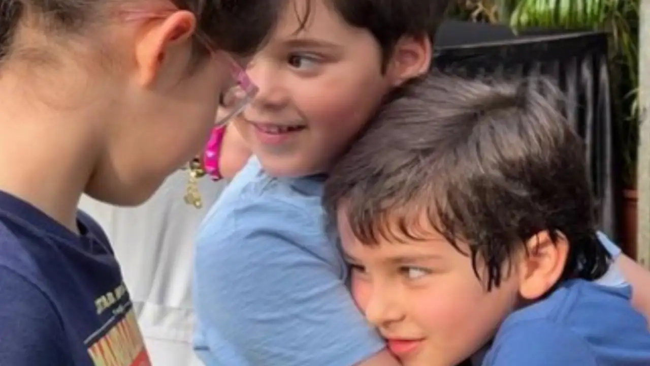 Karan Johar shared the picture of Yash hugging Taimur. Karan Johar shared the picture of Yash hugging Taimur.