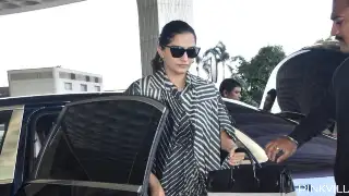 Sonam Kapoor makes heads turn in a black striped dress as she gets clicked at the airport