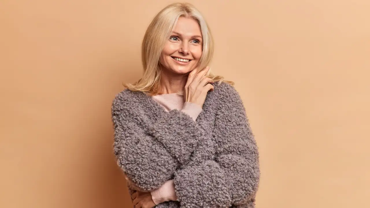 An elderly women after using the Best Shampoos for Aging Hair to Restore Lost Gleam An elderly women after using the Best Shampoos for Aging Hair to Restore Lost Gleam