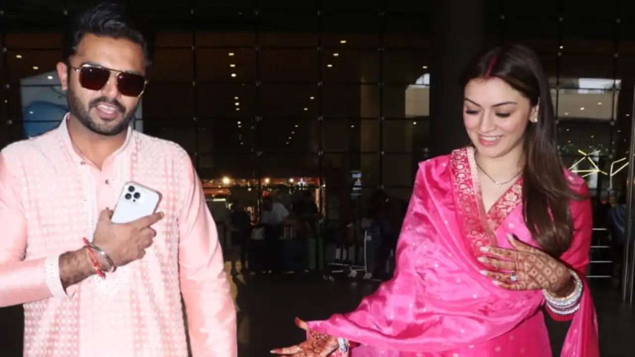 New bride Hansika Motwani returns to Mumbai with her hubby Sohael Khaturiya following her wedding in Jaipur