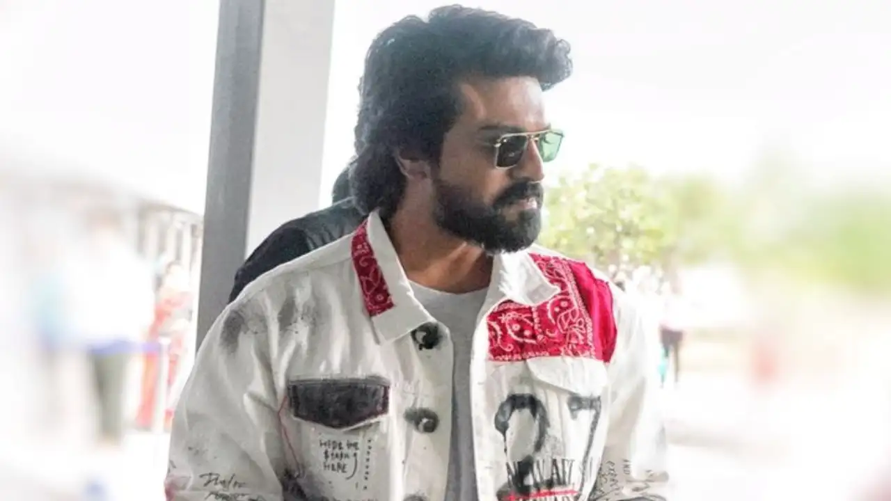 RRR: Ram Charan returns after attending Golden Globes; Clicks selfies with fans at the airport RRR: Ram Charan returns after attending Golden Globes