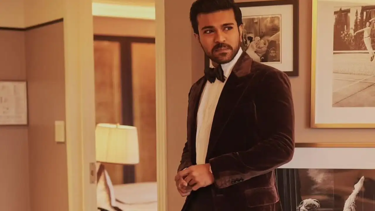 Ram Charan shares RRR's winning glimpses from HCA as he presents award
