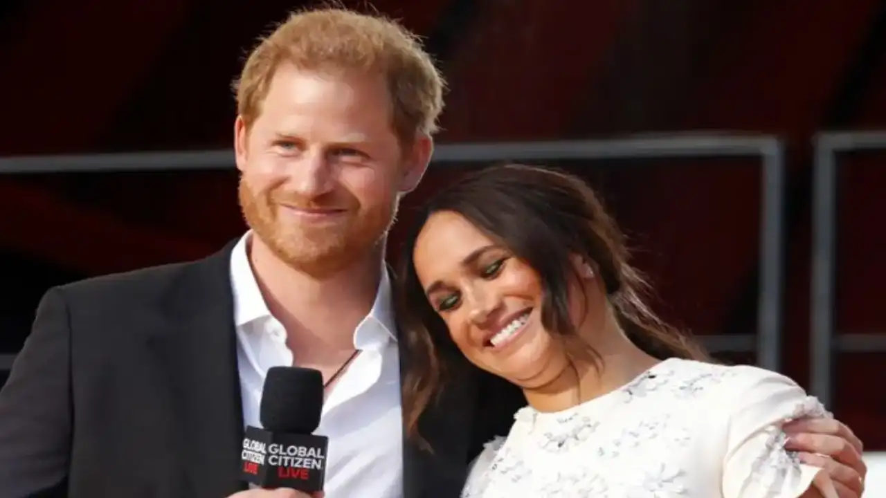 Prince Harry with wife Meghan Markle 