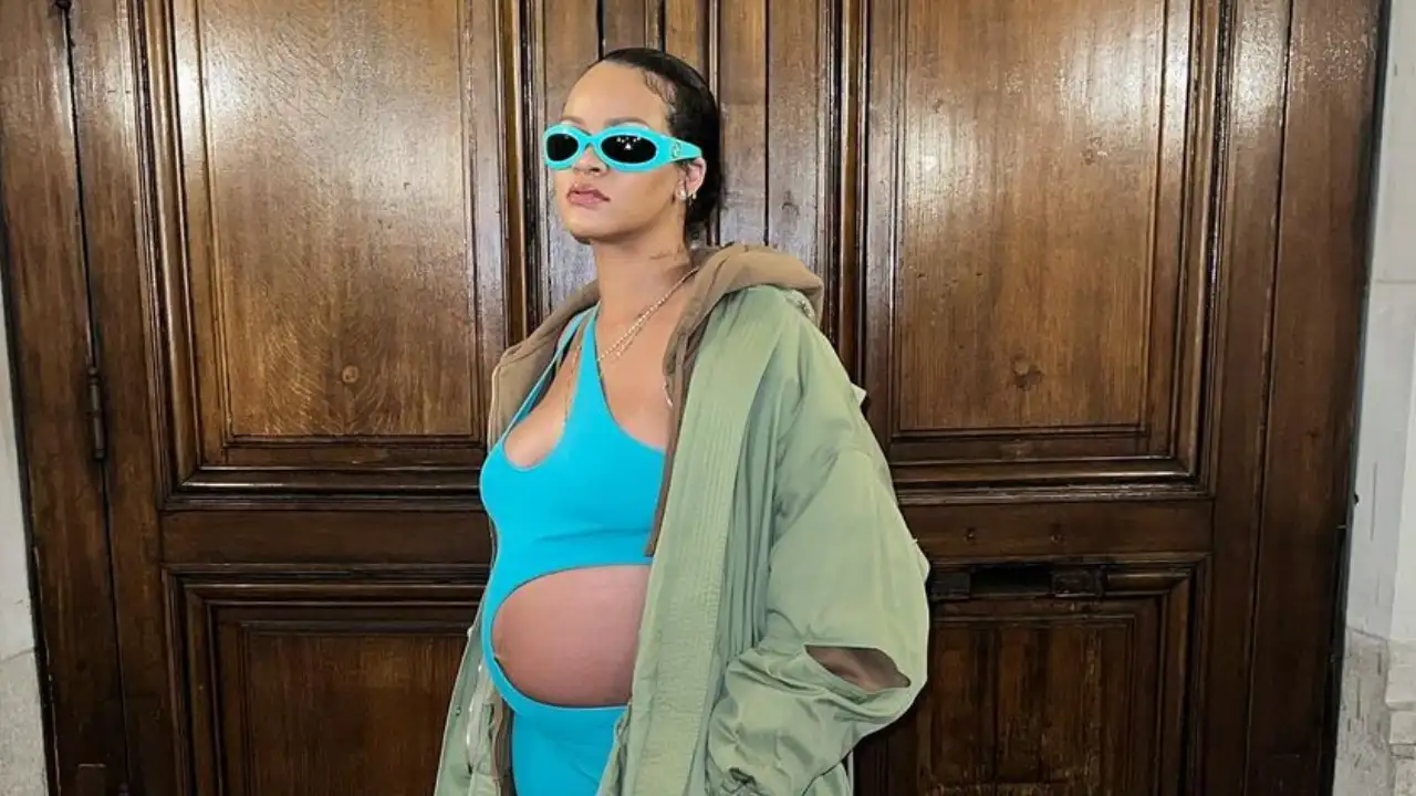 Rihanna took a cute peek at her baby bump as she shared photos from the drive-thru.