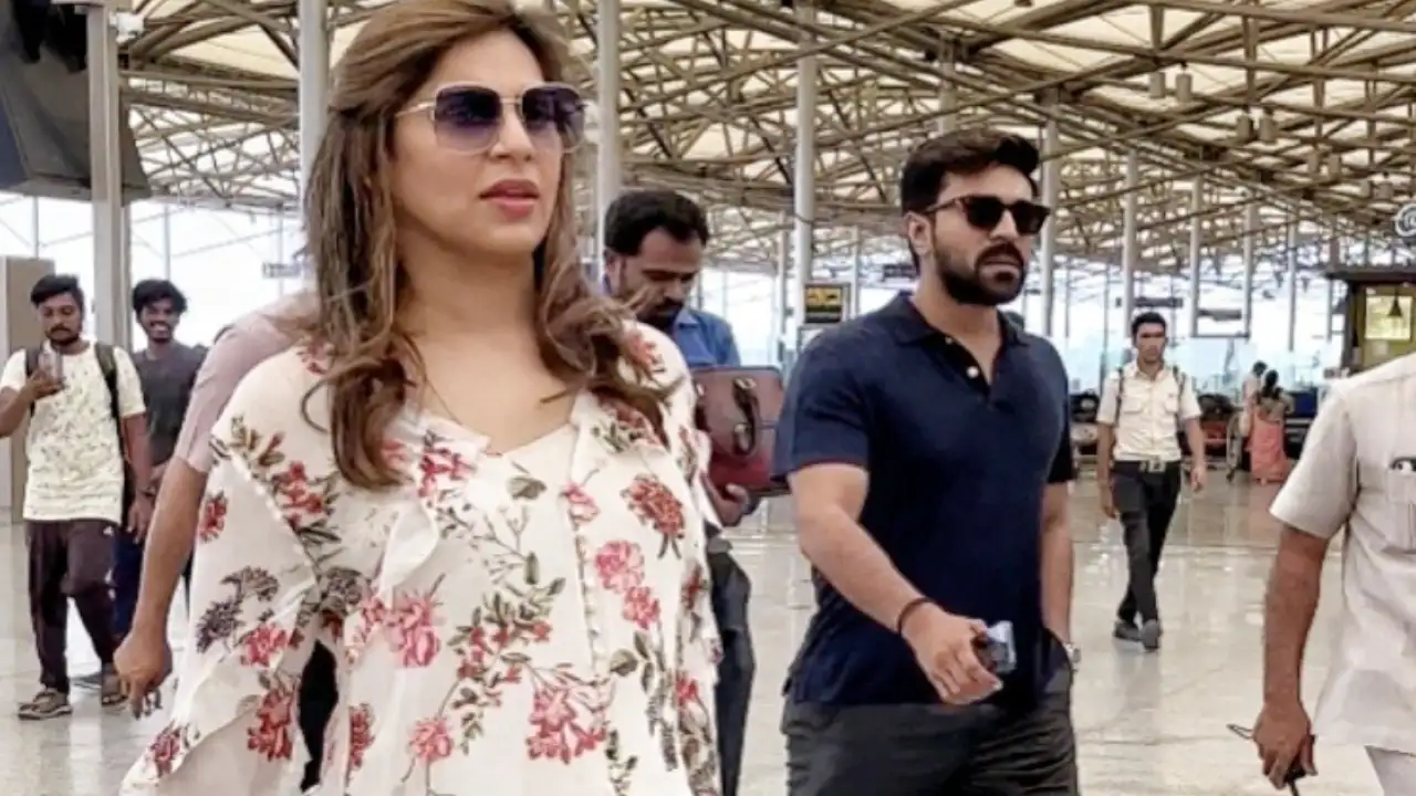 1255464958 ram charan upasana clicked airport1 1280*720