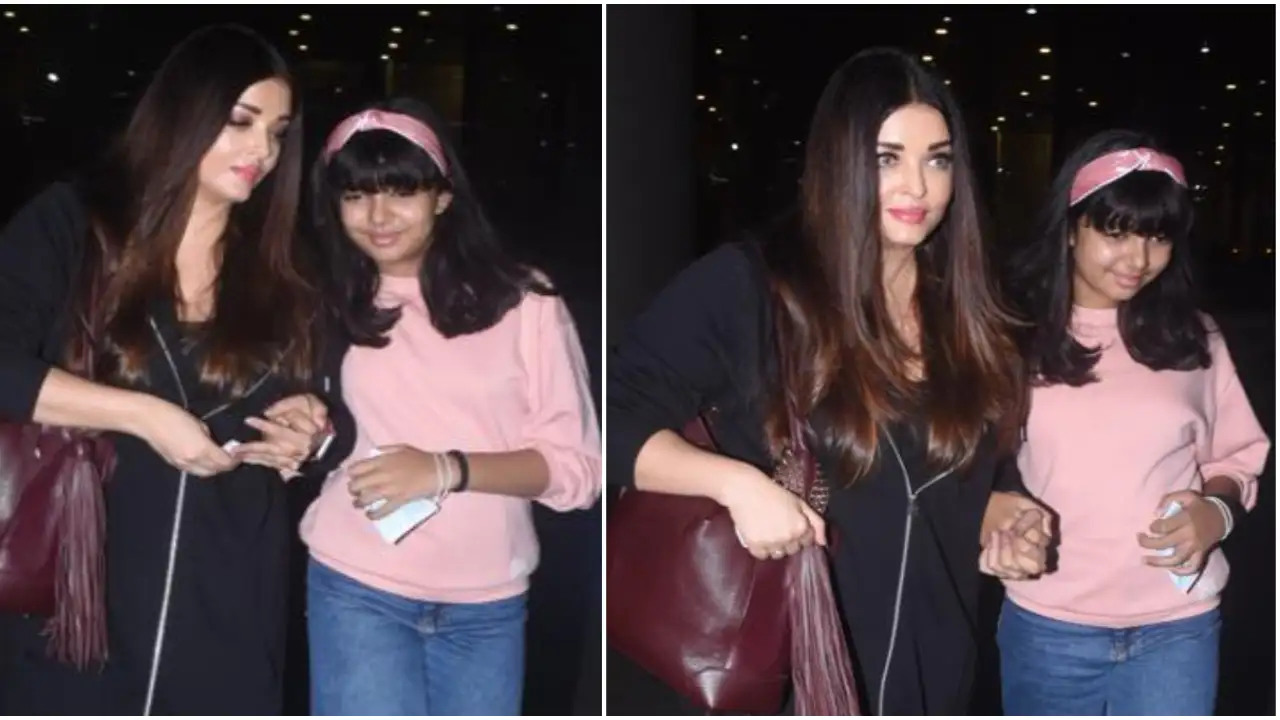 26475049 aishwarya rai bachchan holds aaradhya close as they return to mumbai post ponniyin selvan 2 promotions watch 1280*720