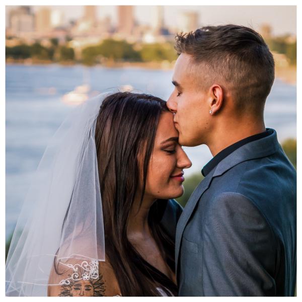 forehead kisses couple wedding