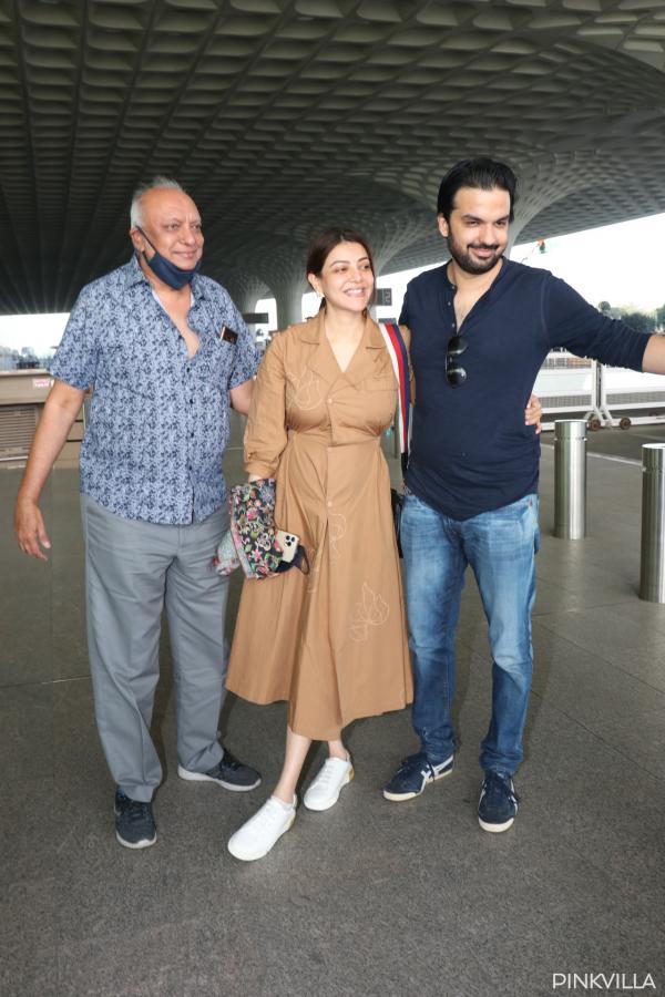 PICS: Kajal Aggarwal poses with her husband & parents at the Mumbai airport  ahead of New Year | PINKVILLA