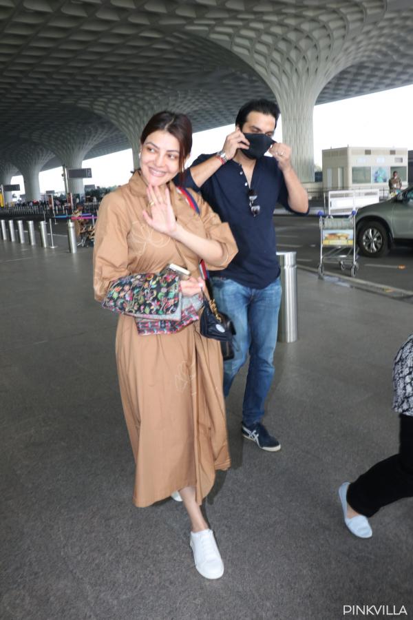 PICS: Kajal Aggarwal poses with her husband & parents at the Mumbai airport  ahead of New Year | PINKVILLA