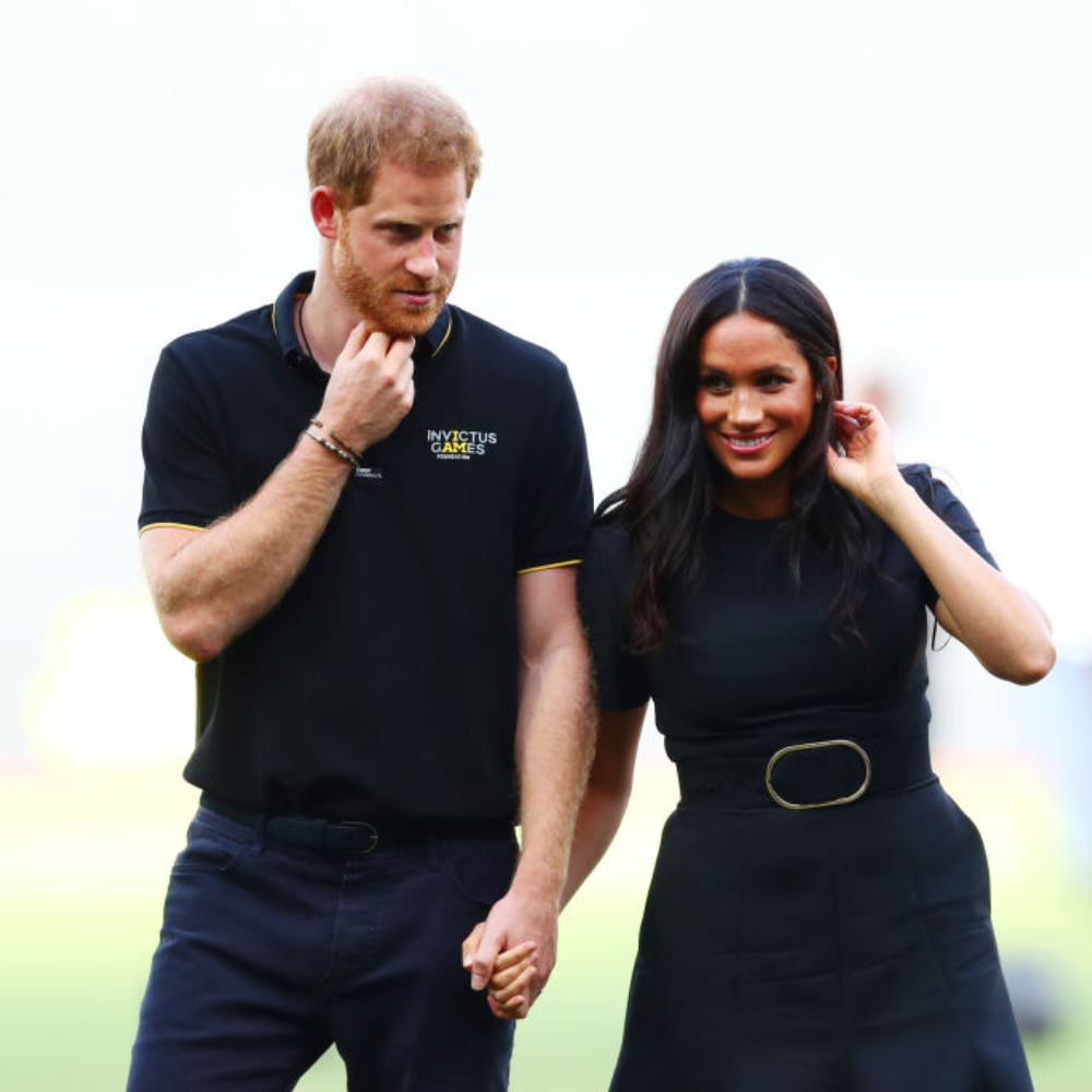 Prince Harry and Meghan Markle cook food as they volunteer for a rehab charity Prince Harry and Meghan Markle cook food as they volunteer for a rehab charity
