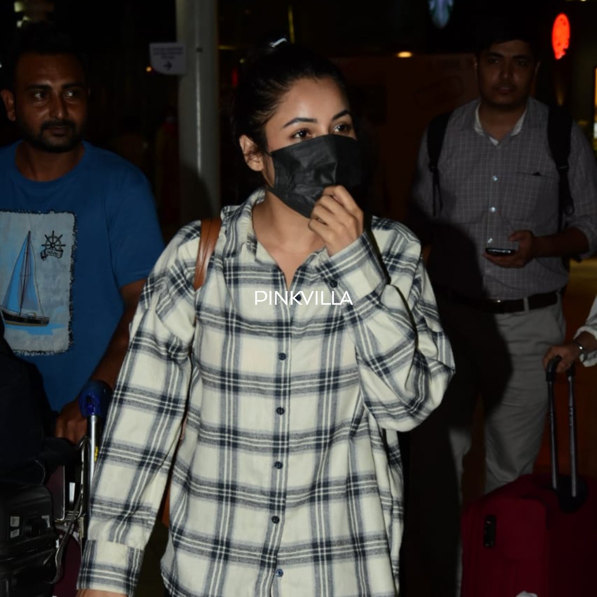 Shehnaaz Gill keeps it chic in black & white shirt and jeans as she gets clicked at the airport; PHOTOS Shehnaaz Gill keeps it chic in black & white shirt and jeans as she gets clicked at the airport; PHOTOS