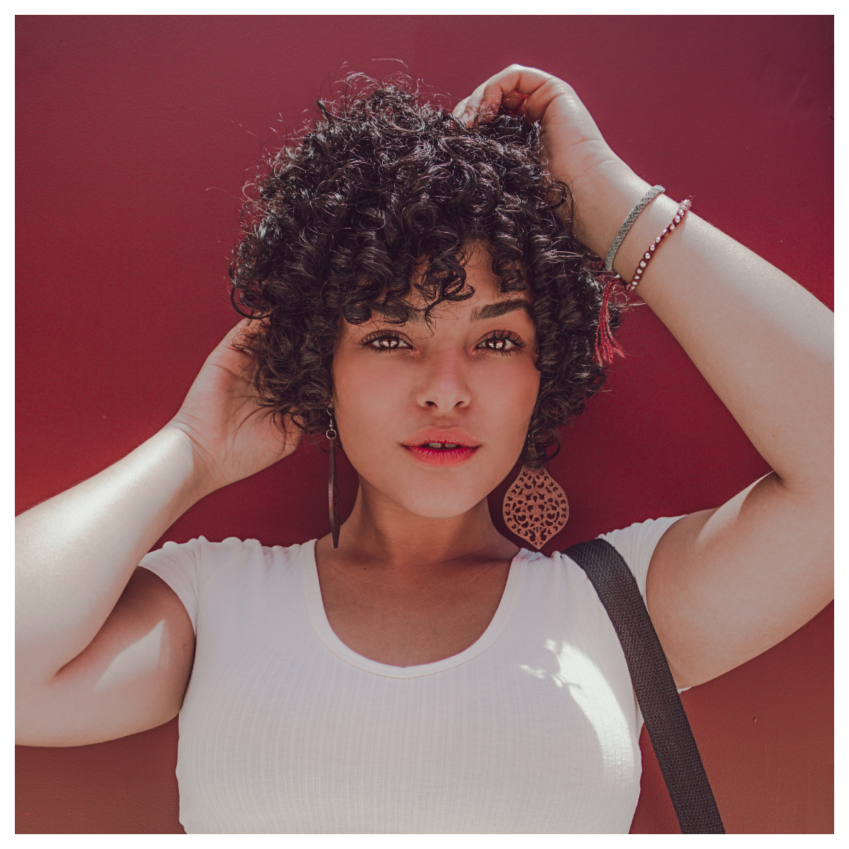 Free Photo  Pretty young black woman with short curly hair