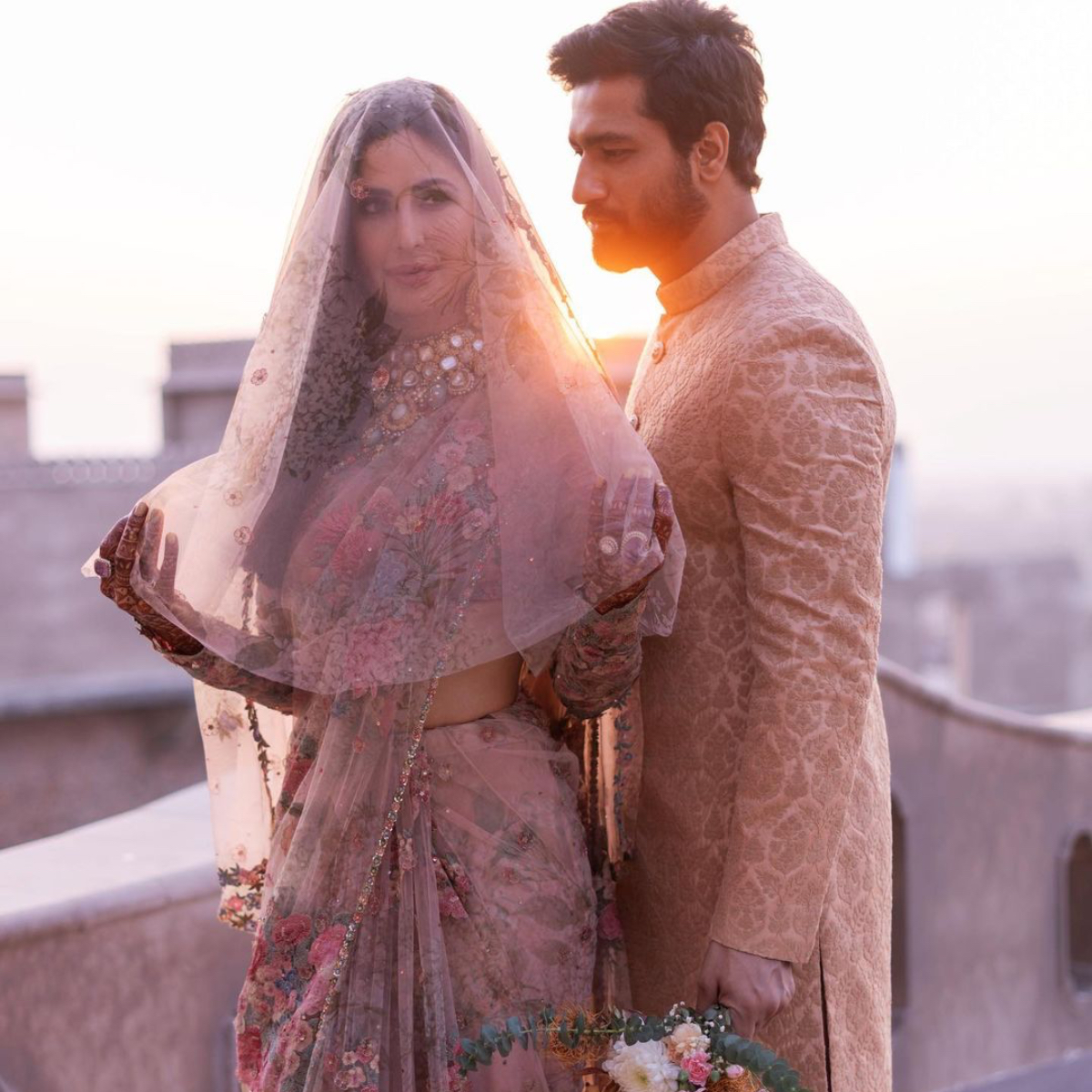 Katrina Kaif looks DREAMY in a floral Sabyasachi saree and sheer veil with Vicky Kaushal in a sherwani 