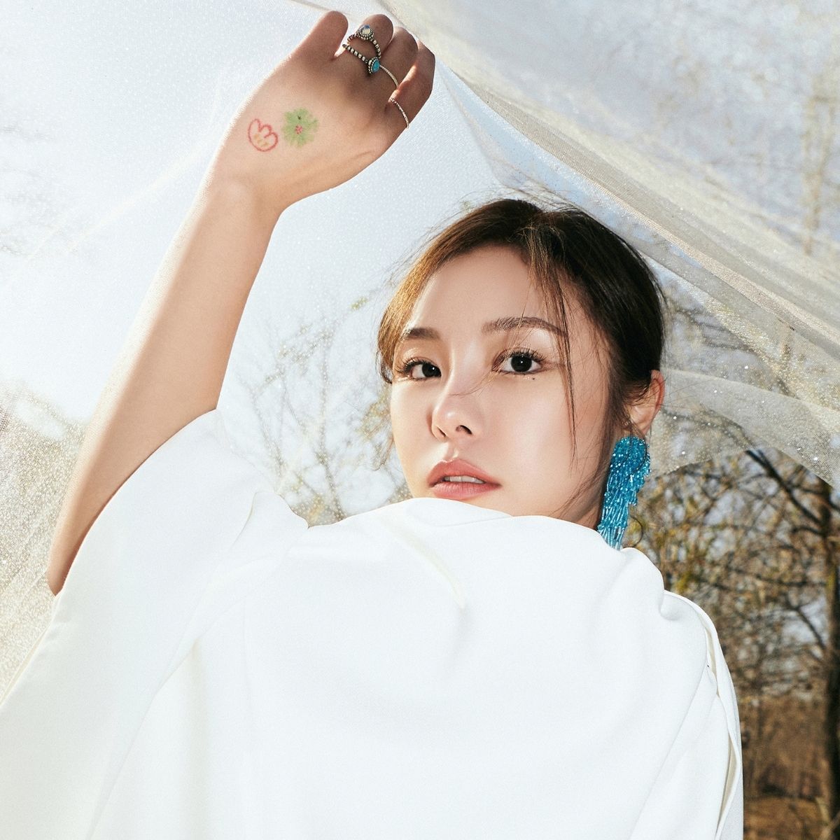 EXCLUSIVE: Whee In opens up on the story of Make Me Happy, symbolism with butterflies & ‘Hospital Playlist’