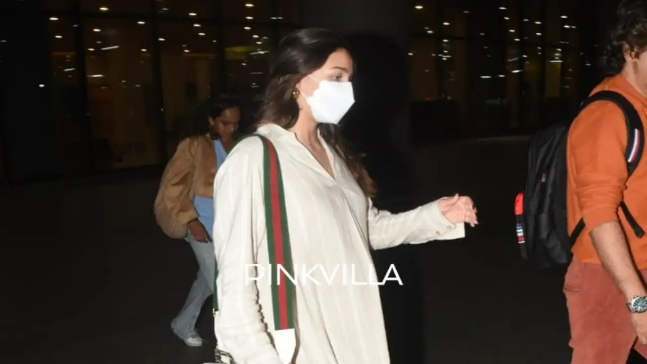 Alia Bhatt returns from Singapore, clicked at the airport in a comfy midi dress; PHOTOS