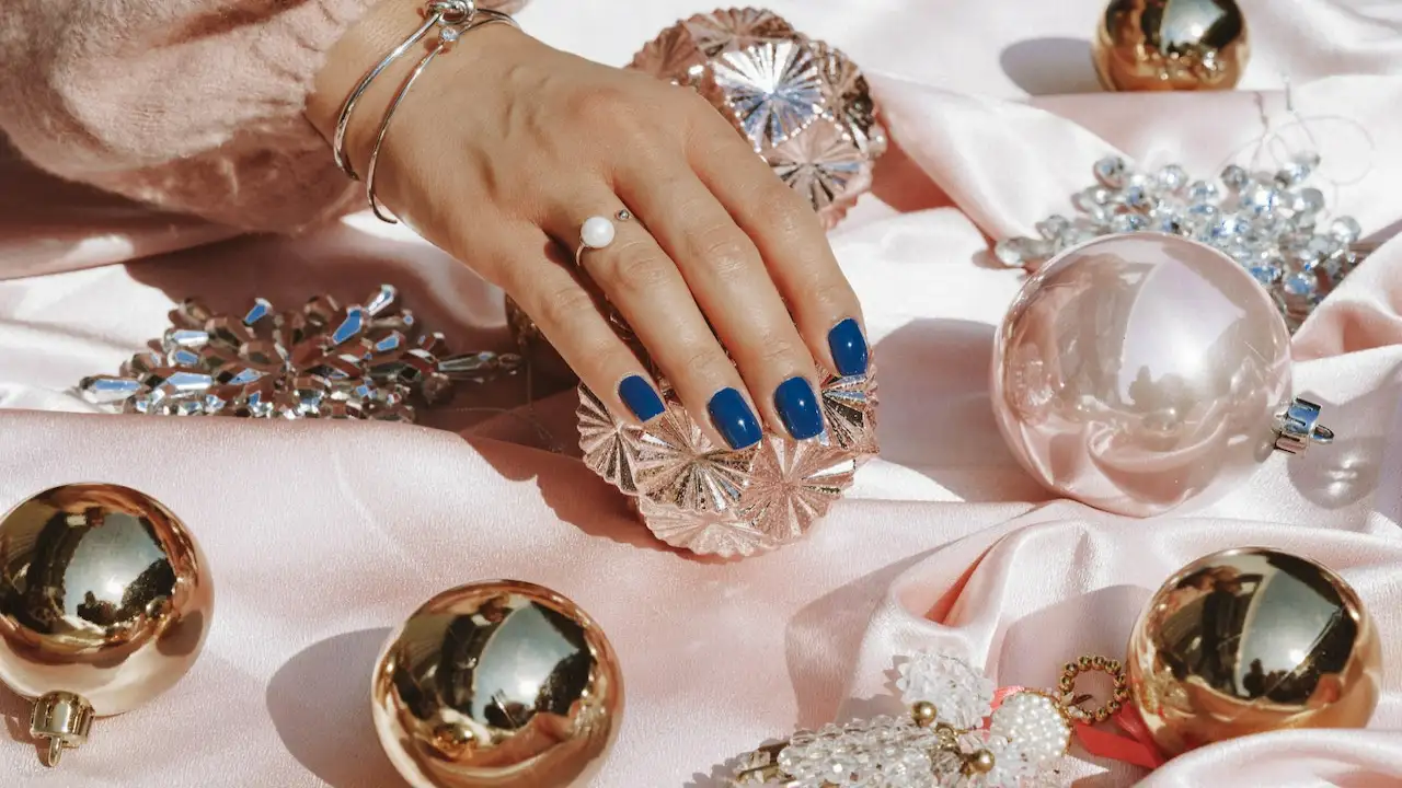 Nail Manicure in royal blue using a poly gel nail kit to ace your nail game