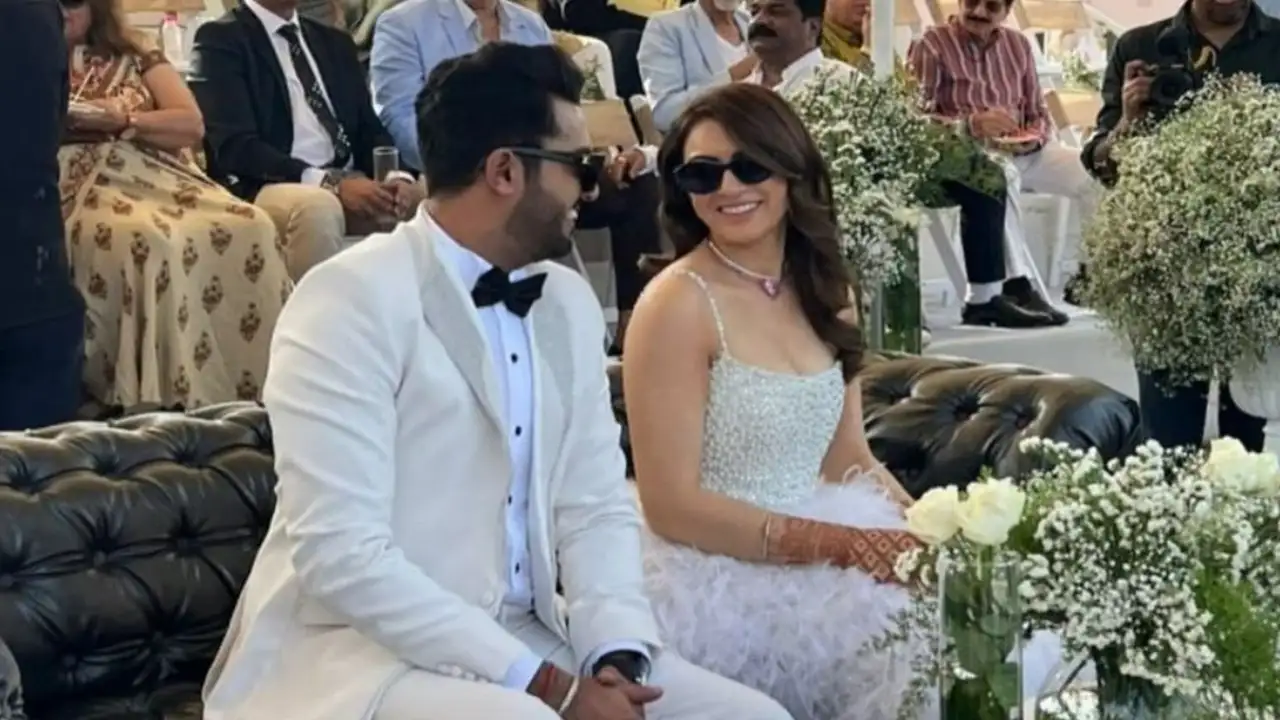 Picture courtesy: Pinkvilla South Instagram Hansika Motwani and Sohael Khaturiya get clicked at their pre-wedding bash