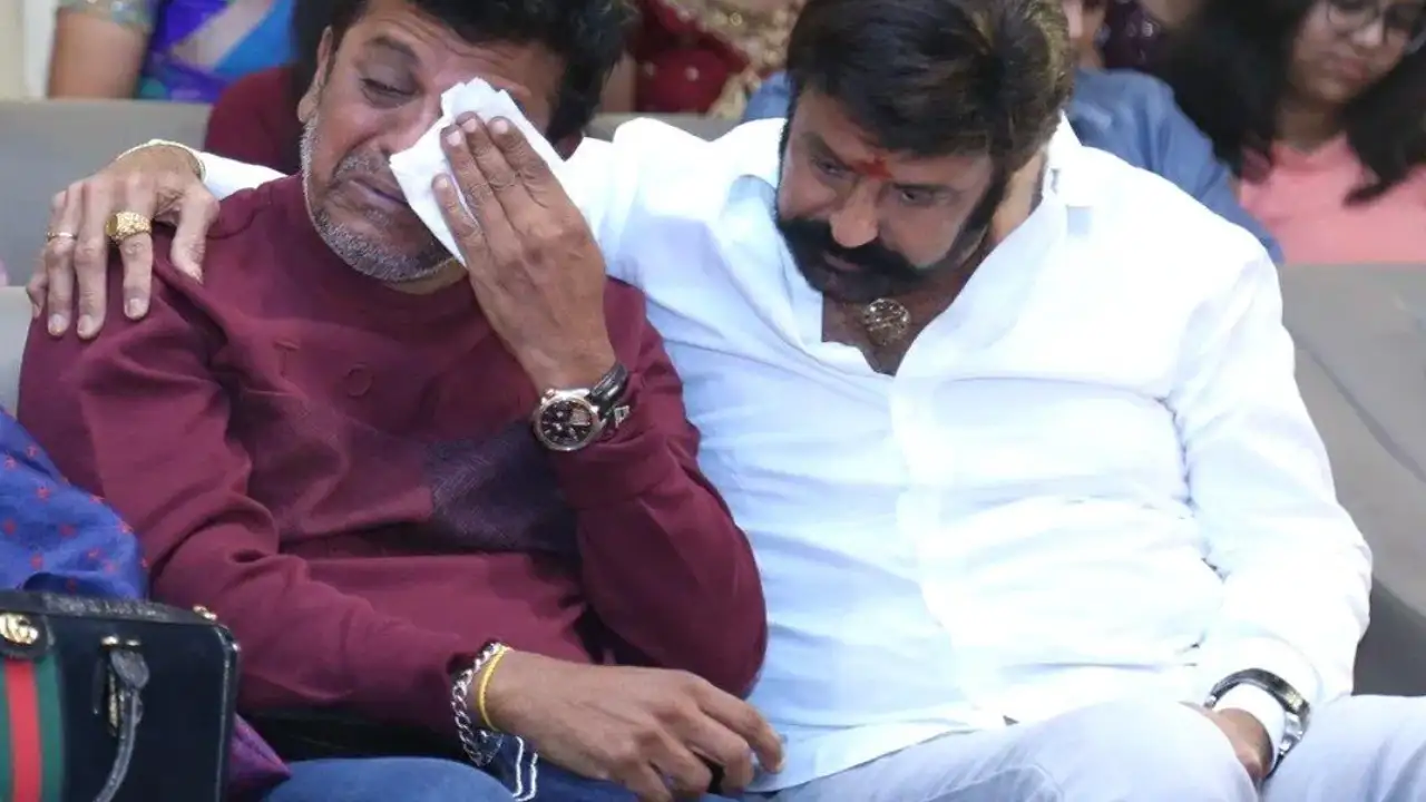 Shivarajkumar breaks into tears watching brother Puneeth's video at an event; Balakrishna consoles him 