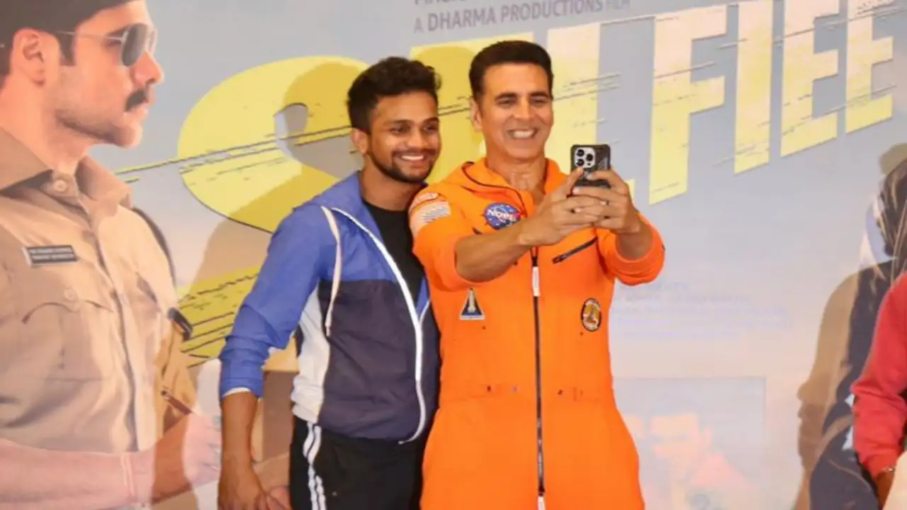 Akshay Kumar takes a selfie with a fan