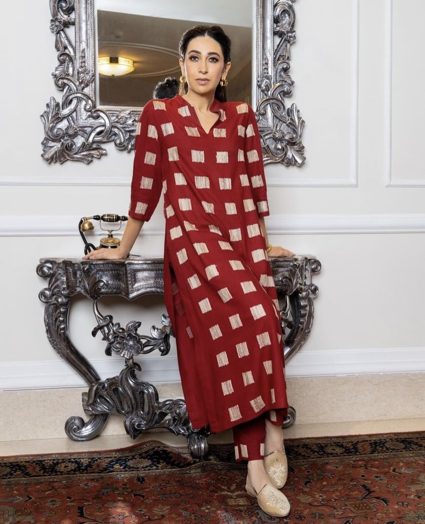 Karisma Kapoor in a red outfit