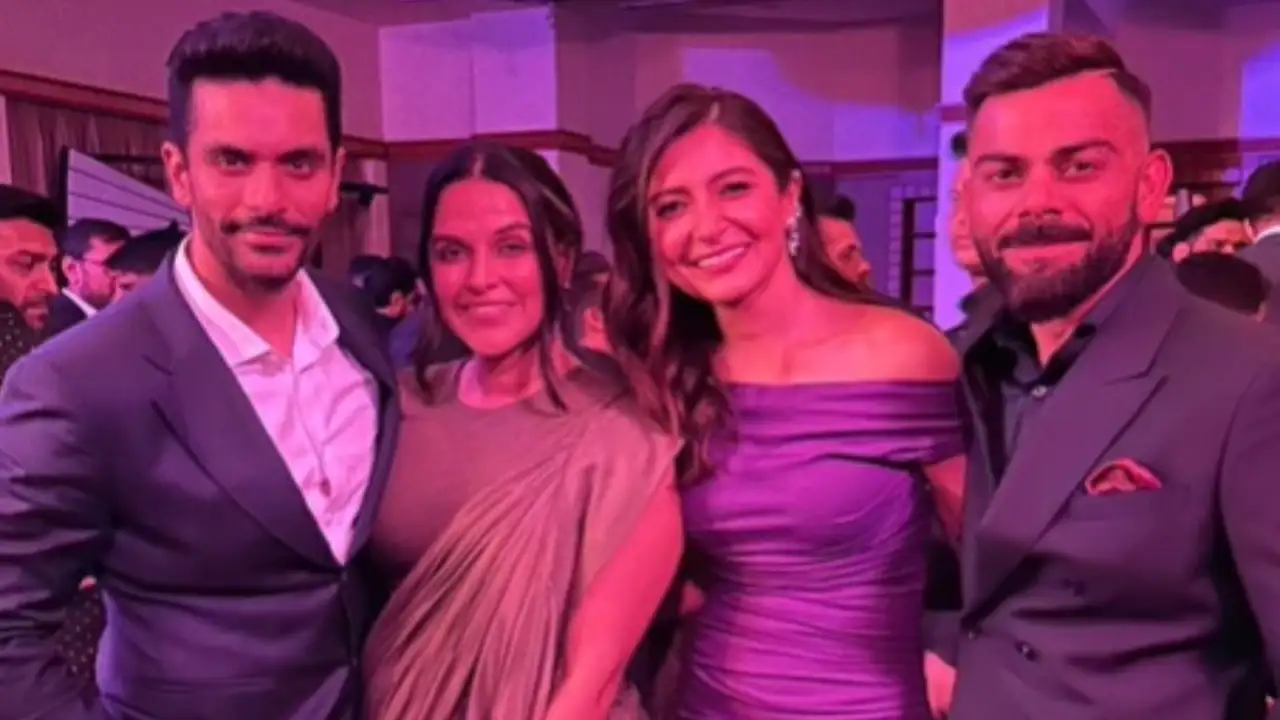 Neha Dhupia-Angad Bedi look glam, pose with Virat Kohli-Anushka Sharma at an event last night; See Pic