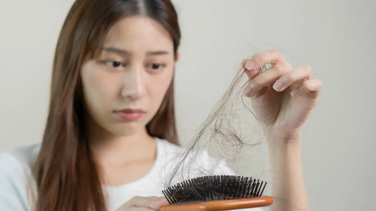 How to Stop Hair Fall Naturally And Get Luscious Tresses