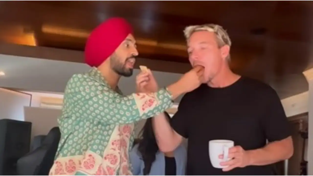 Picture courtesy: Instagram Diljit Dosanjh and DJ Diplo relish desi sweets in new video; Latter's reply in Punjabi breaks the Internet
