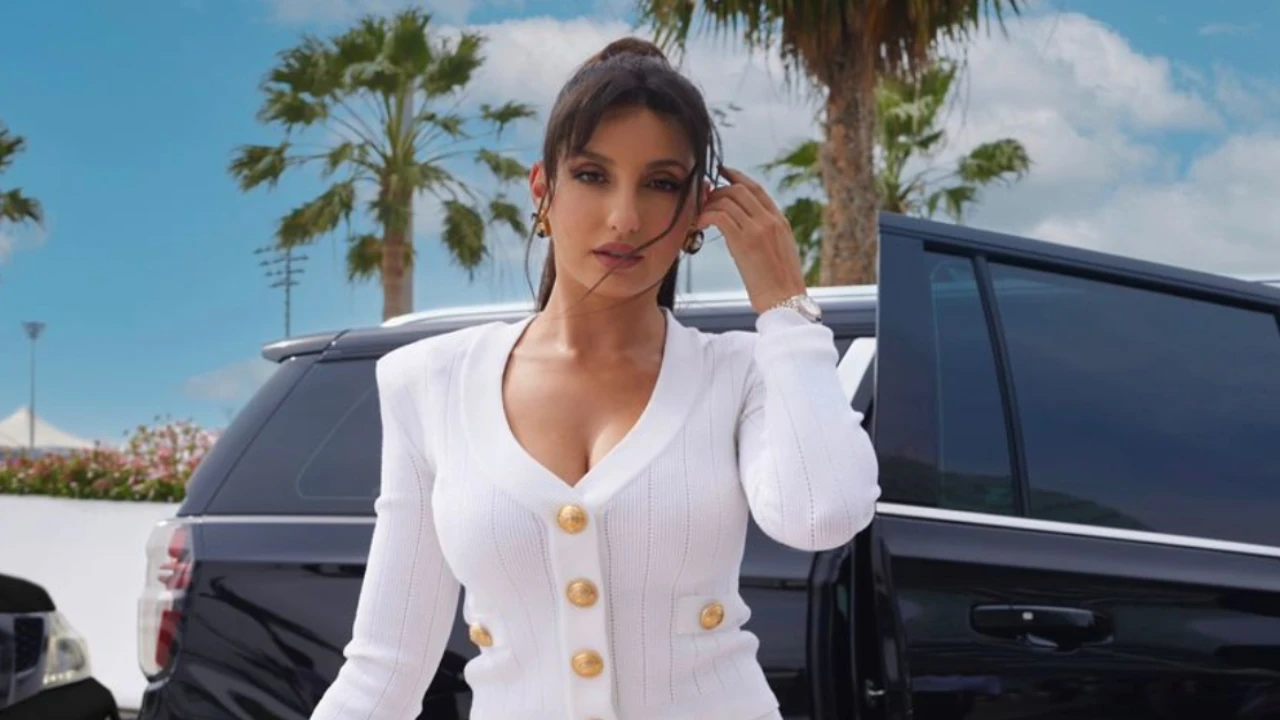 Nora Fatehi exudes beauty in a classy white Balmain knit cardigan and pencil  skirt; Know how much it all costs | PINKVILLA