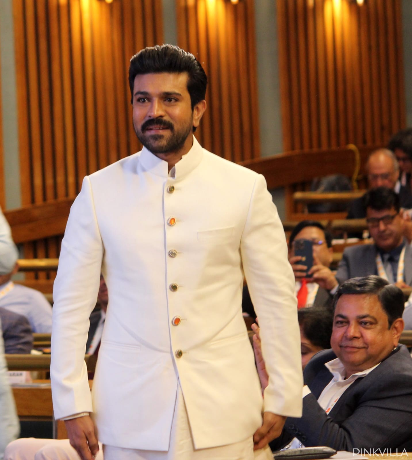 Ram Charan looks dapper in an off-white ethnic outfit.