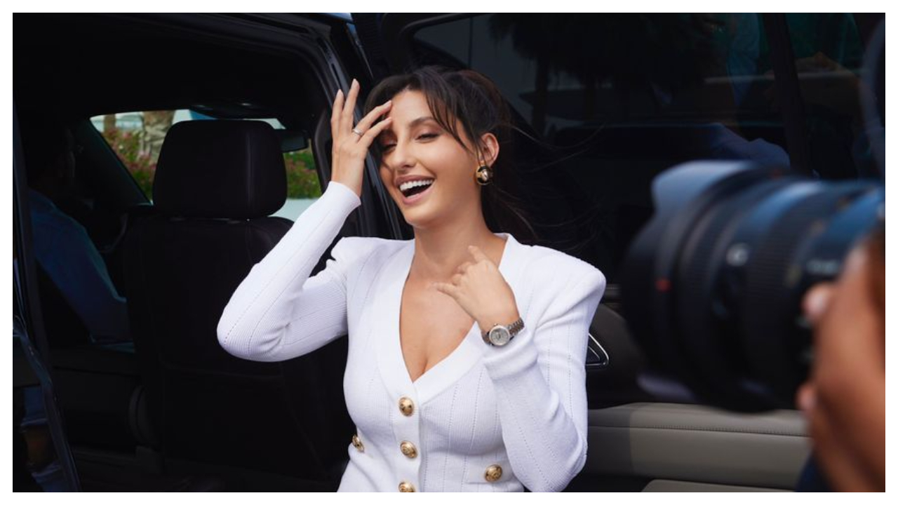 Nora Fatehi exudes beauty in a classy white Balmain knit cardigan and pencil  skirt; Know how much it all costs | PINKVILLA