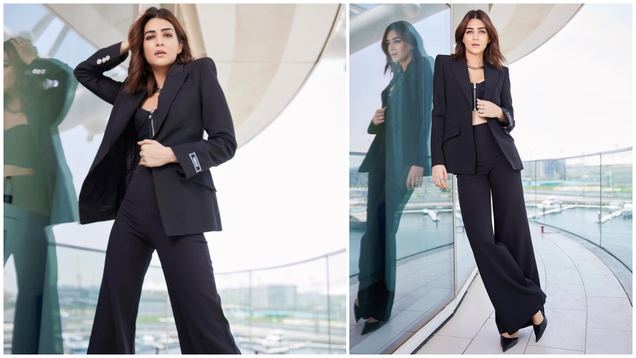Kriti Sanon trong chiếc quần Versace màu đen sang trọng được tạo kiểu với đôi giày cao gót của Jimmy Choo hét lên 'bà chủ'