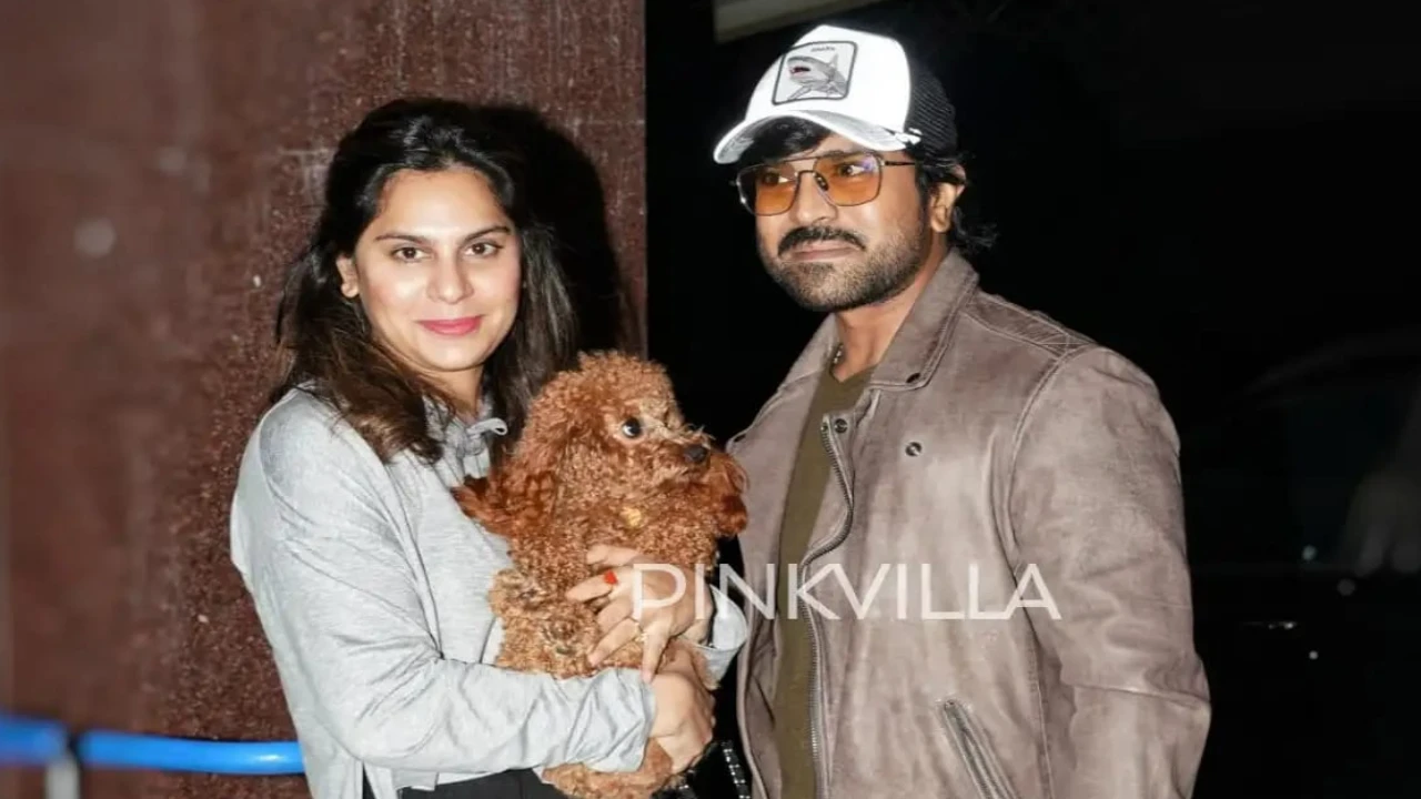 Ram Charan clicked at Hyderabad airport; Pregnant wife Upasana flaunts baby bump as she carries pet Rhyme Parents-to-be Ram Charan, Upasana clicked at Hyderabad airport