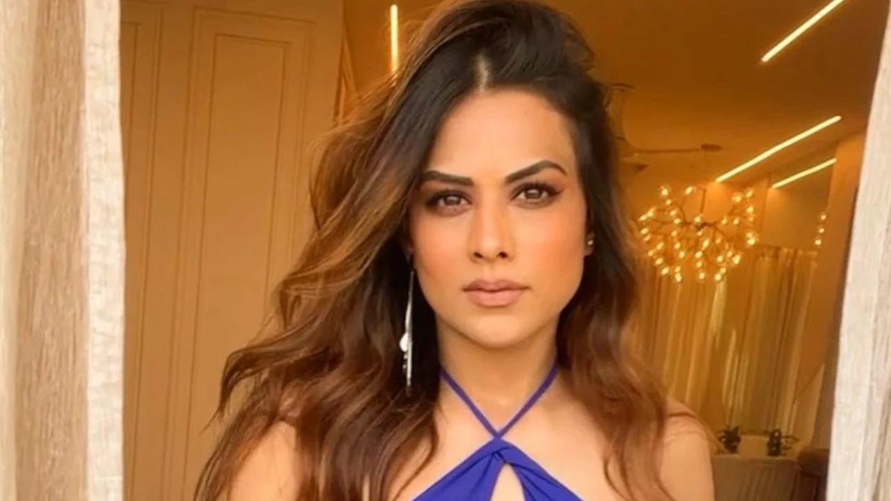 Nia Sharma is 'busy looking nice these days' as she poses in a plunging neckline top; see PICS nia sharma