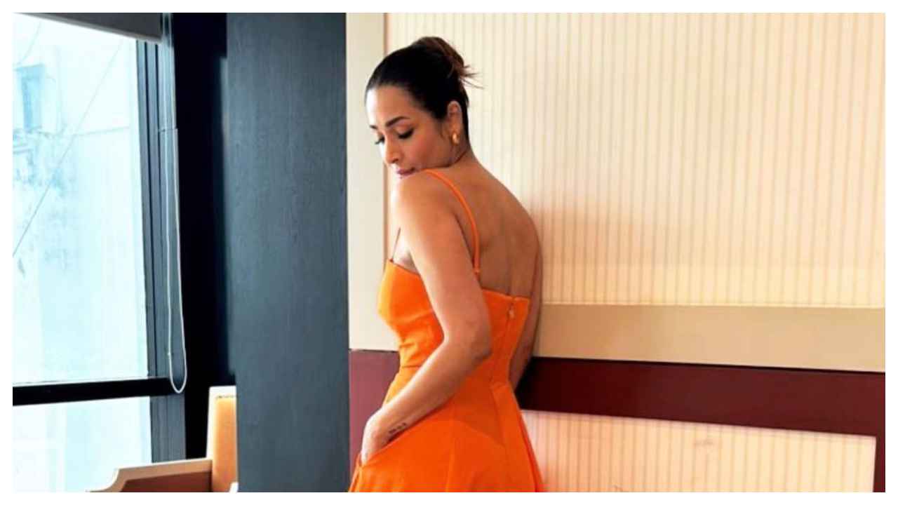 Malaika Arora stuns in Orange Kate Spade New York dress, perfect for romantic  date night | PINKVILLA