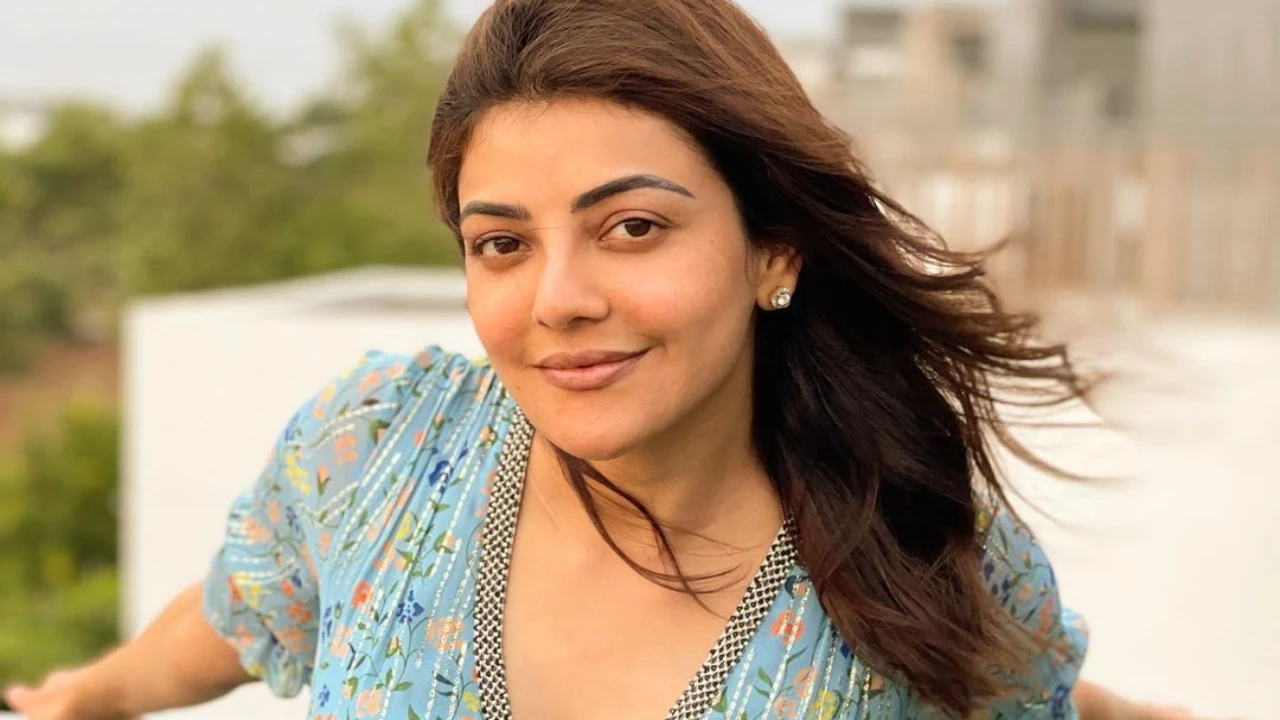 Kajal Agarwal In Stylish Top And Smiley Face Closeup Wallpaper