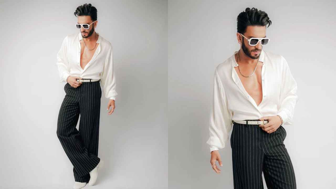Ranveer Singh looks like a modern-day Victorian prince in unbuttoned shirt, striped  trousers with accessories | PINKVILLA
