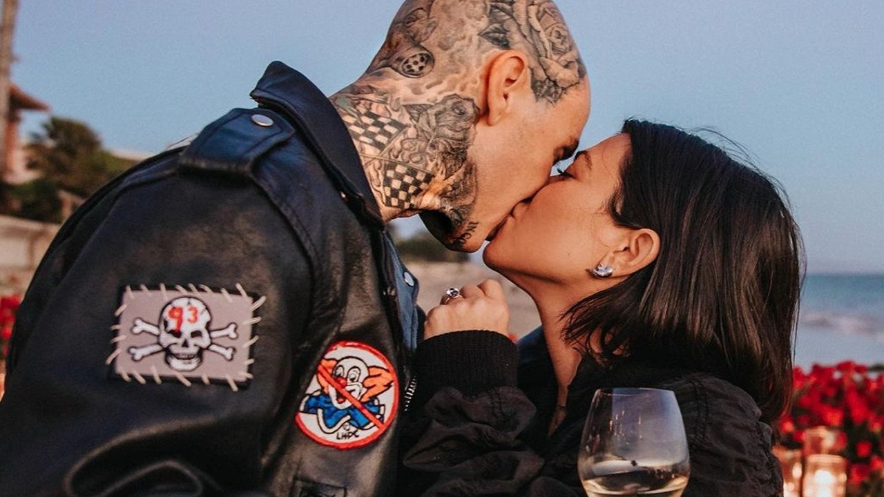 Kourtney Kardashian and Travis Barker are 'over the moon in love' ahead of one year wedding anniversary