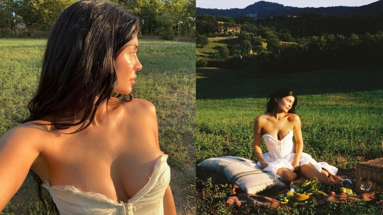 Kylie Jenner channels cottagecore vibes enjoys champagne and croissants donning strapless white sundress on Italian vacation