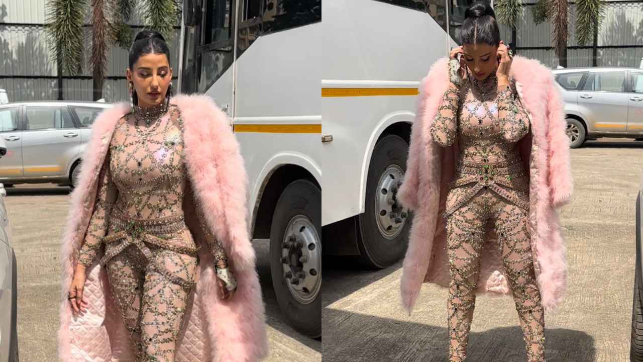 Nora Fatehi looks enchanting in baby pink blingy bodysuit with matching fur coat, and statement accessories | PINKVILLA
