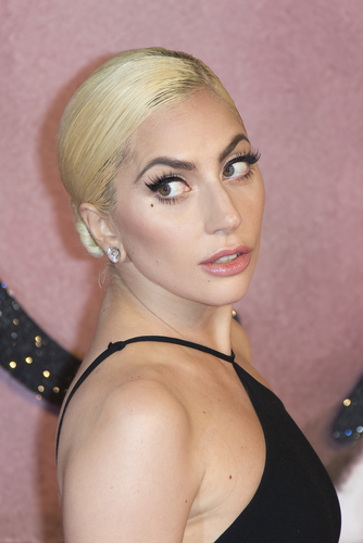 Lady Gaga uses facelift tape to shape her face and look younger - Mirror  Online